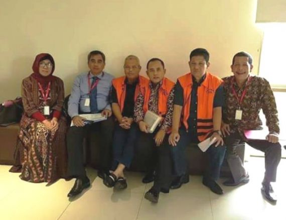 Tersangka kasus uang suap pengesahan RAPBD Provinsi Jambi tahun 2018. Erwan Malik, Saipuddin dan Arfan.