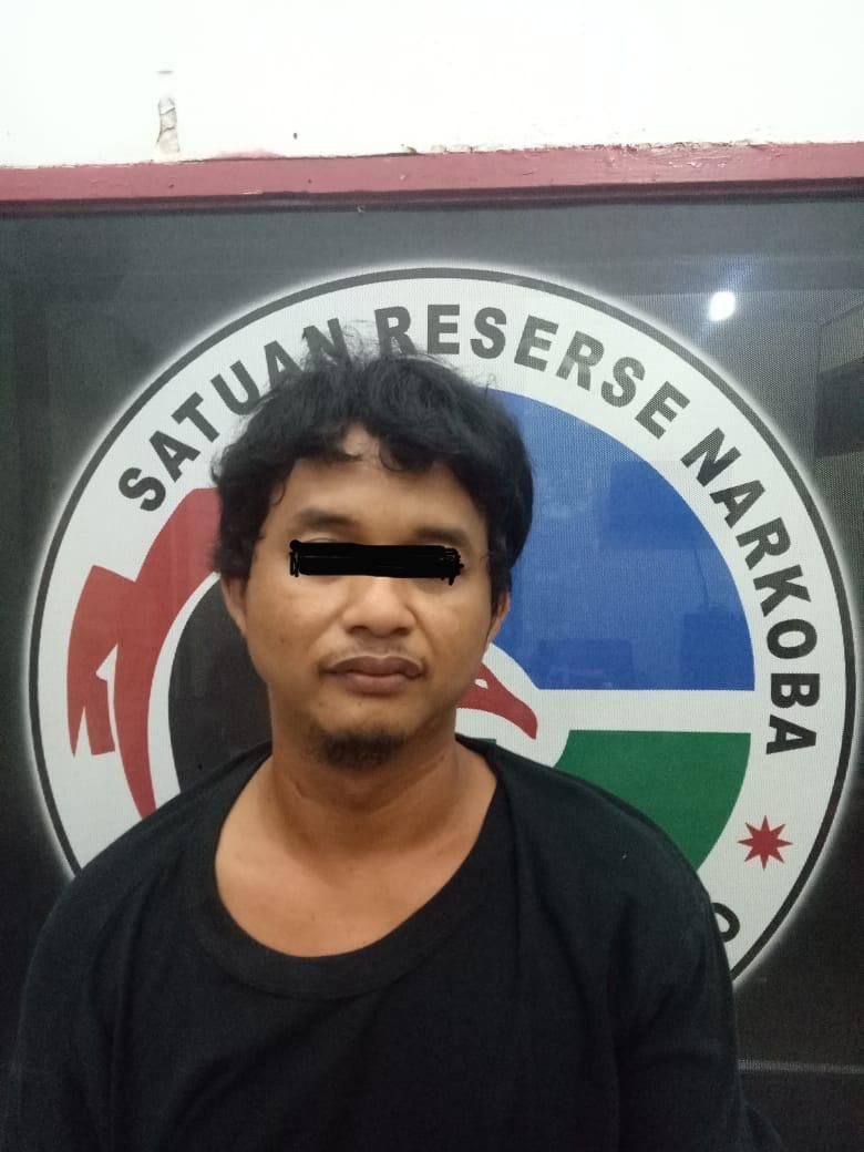 Tersangka RA yang diamankan polisi