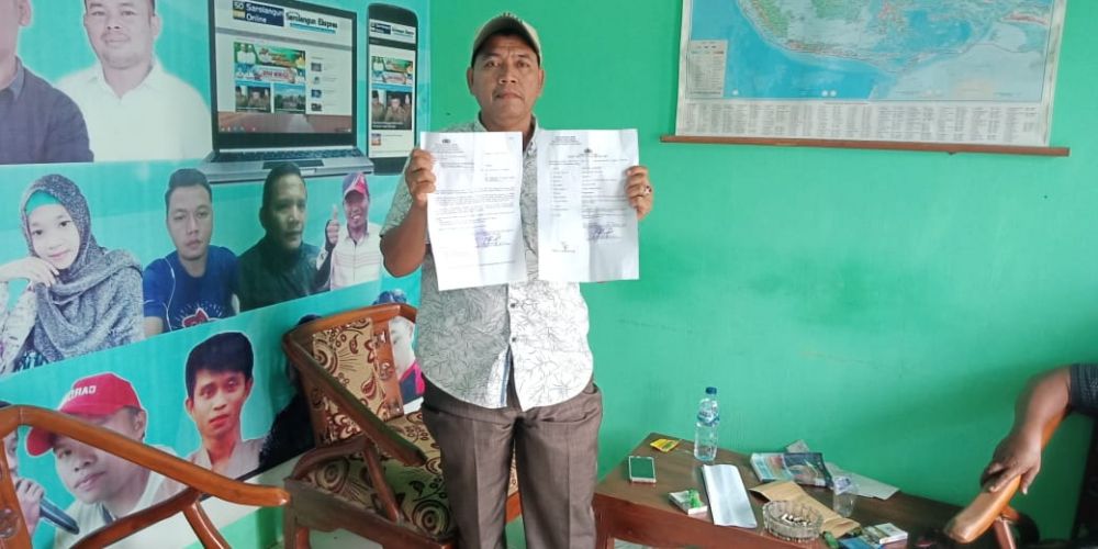 Korban penganiayaan, Rizal memegang bukti laporan polisi