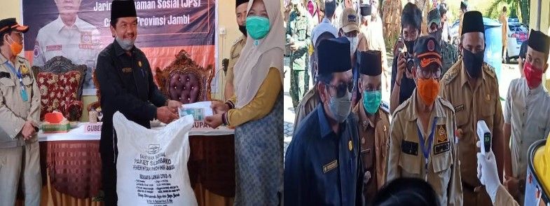 Ketua DPRD Sarolangun, Tontawi Jauhari dan Wabup H Hillalatil Badri mendampingi Gubernur H Fachrori Umar diacara penyerahan Bansos JPS Pemprov Jambi di Kantor Camat Bathin VIII