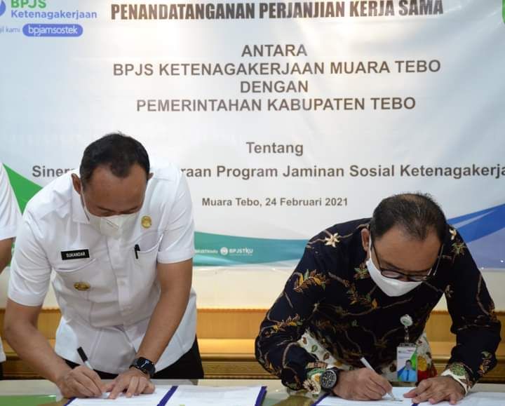 Penanda tanganan perjanjian kerjasama Pemkab Tebo dan BPJS Ketenagakerjaan