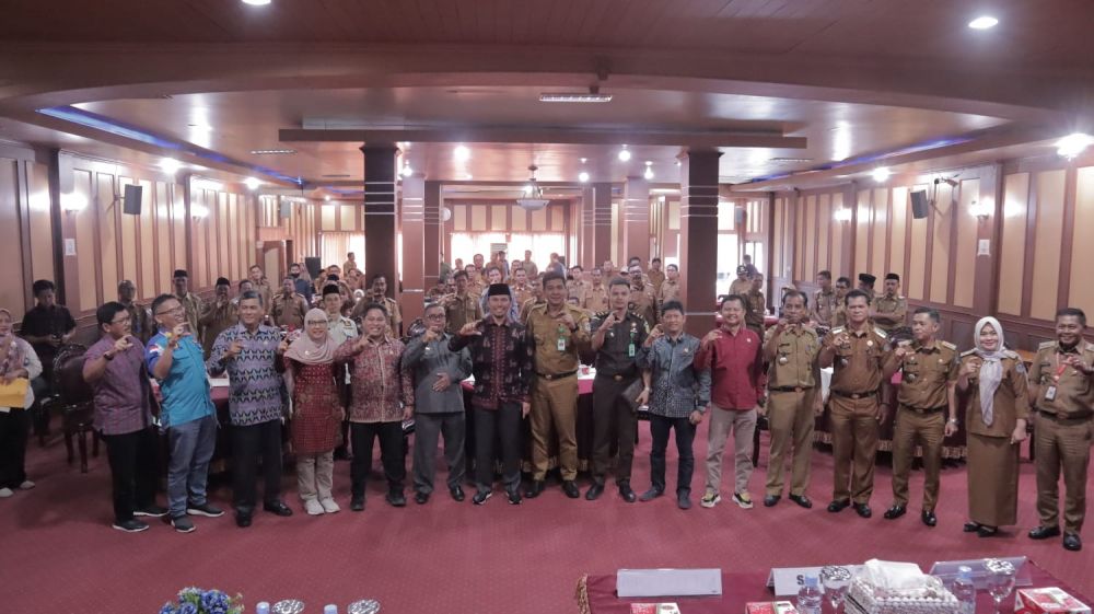 Sosialisasi Peraturan Komisi Informasi No 1 Tahun 2018 tentang Standar Layanan Informasi Publik (SLIP) Desa yang digelar Komisi Informasi Provinsi Jambi Selasa (6/12/2022). 