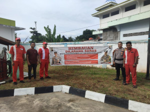 Melalui Bhabinkamtibmas, Polsek Tebo Tengah Edukasi Larangan Langsir SPBU di Km 10 Muaro Tebo 
